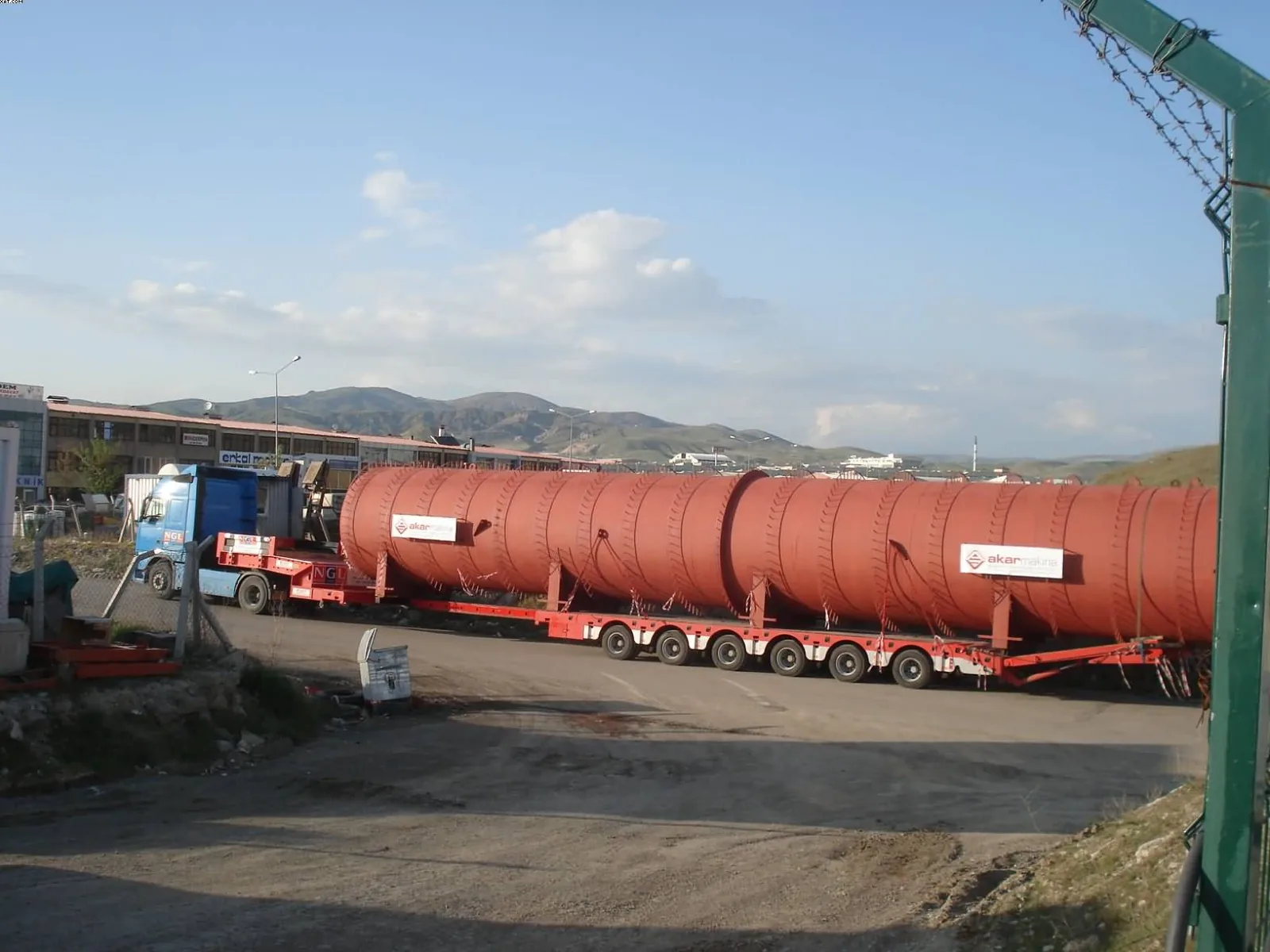 Oversize industrial tank loaded on a lowbed trailer
